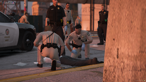 First aid by officers after being chased and rescued from a burning car