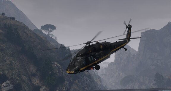 Border Patrol UH60 on mountains