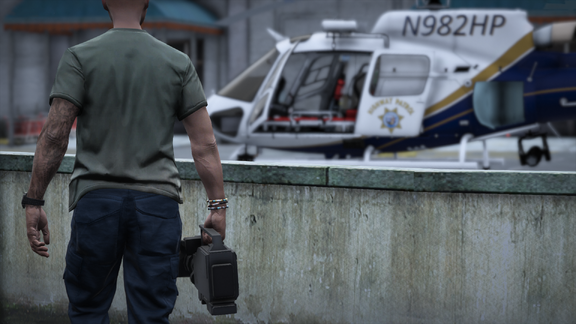 Steel wings rest while the city breathes