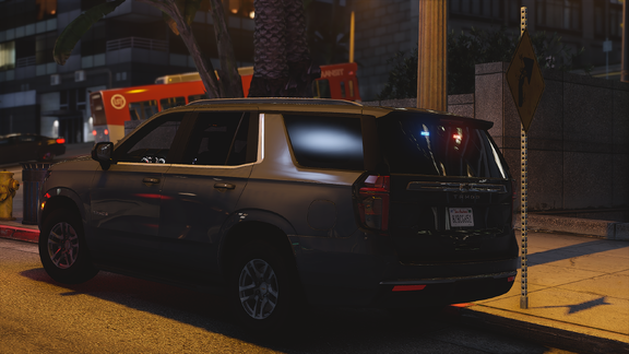 Dark SUV by the Curb